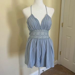 Blue romper with floral pattern